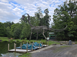 dinosaur at fishing pond